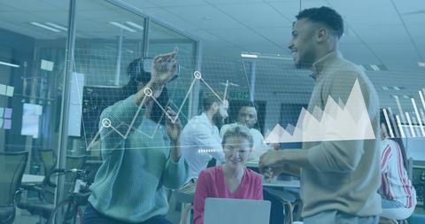 Team collaborating on interactive data visualization and analytics in modern office workspace