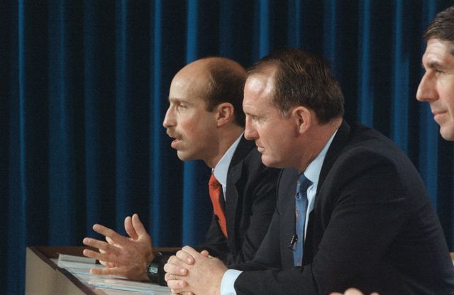 S89-25327 (11 Jan 1989) --- Two crewmembers for NASA's STS-29 mission ponder a question from a news reporter during a press conference concerning their scheduled mid-March flight.  James P. Bagian, at left, begins to answer the query, as James F. Buchli listens. Out of the frame are other members of the crew--Astronauts Michael L. Coats, mission commander; and John E. Blaha and Robert C. Springer.  The five will deploy a tracking and data relay satellite from Discovery's cargo bay as well as perform other important chores on their scheduled five-day flight.