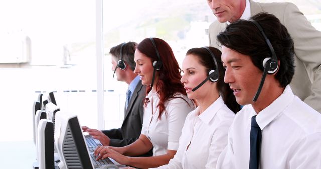 Diverse Customer Service Team Working at Call Center - Download Free Stock Images Pikwizard.com