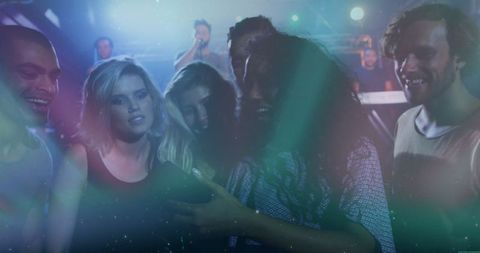 Friends Capturing Moment at Vibrant Music Concert