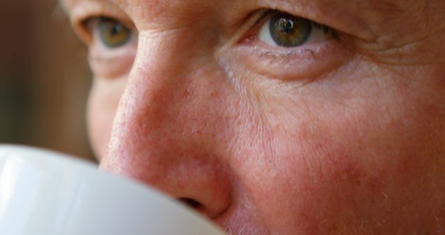 Thoughtful Senior Man Enjoying Warm Coffee at Home - Download Free Stock Images Pikwizard.com