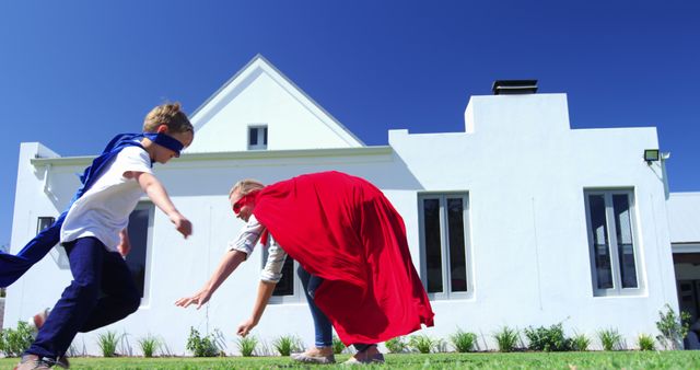 Children Playing Superheroes In Front Yard On Sunny Day - Download Free Stock Images Pikwizard.com