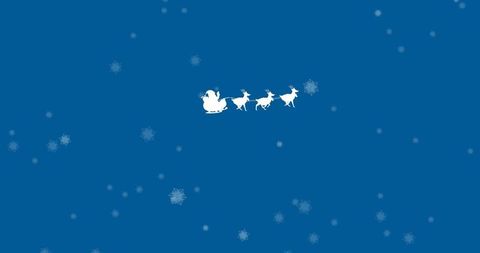 Silhouette of Santa Riding Sleigh Through Starry Blue Night