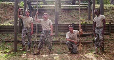 Soldiers Conquering Outdoor Obstacle Course Together - Download Free Stock Images Pikwizard.com