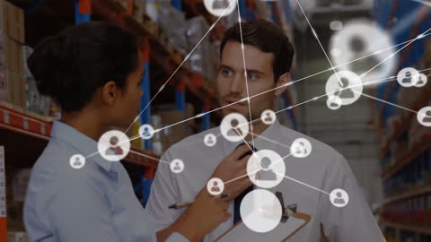 Diverse Warehouse Team Discussing Connectivity