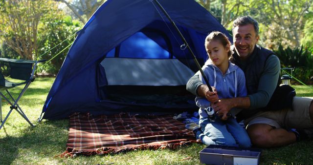 Father Teaching Daughter Fishing During Outdoor Camping Trip - Download Free Stock Images Pikwizard.com