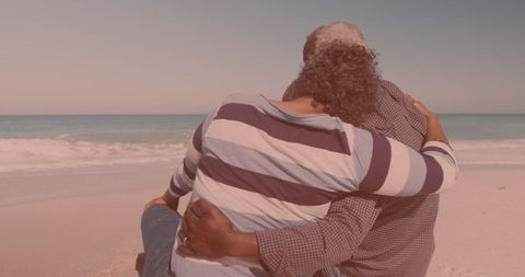 Senior Couple Embracing at Serene Beachfront - Download Free Stock Images Pikwizard.com