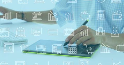 Businessman using digital tablet stylus with finance and analytics icons overlay for fintech