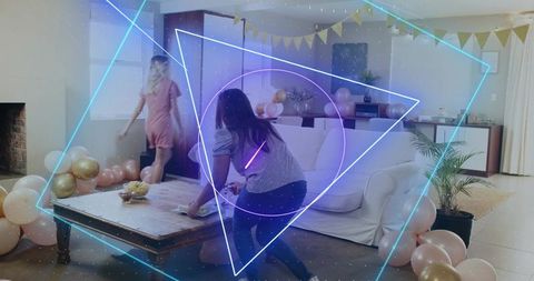 Women decorating living room for party with pink balloons and neon geometric overlay