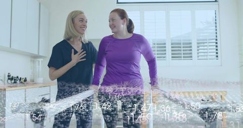 Personal Trainer and Client Exercising Together at Home