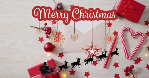 Festive Christmas Decor with Gifts, Envelope and Santa Silhouette - Download Free Stock Images Pikwizard.com
