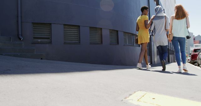 Diverse Female Friends Walking in City on Sunny Day - Download Free Stock Images Pikwizard.com