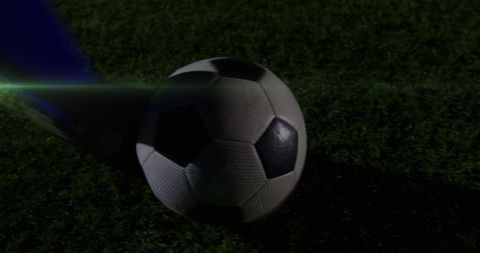 Football Player Kicking Ball with Light Trails at night - Download Free Stock Images Pikwizard.com