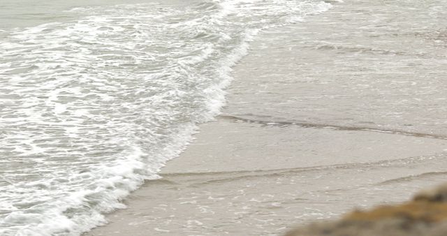 Gently Rolling Waves Reaching Sandy Shoreline - Download Free Stock Images Pikwizard.com