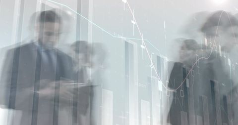 Business Professionals Moving with Financial Graphs Overlay