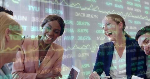 Diverse Business Team Analyzing Stock Market Trends Together