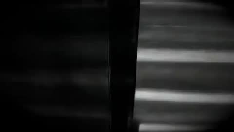 Rotating Disc Casting Abstract Shadows on Chamber