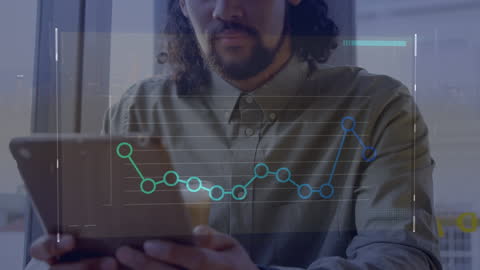 Businessman Analyzing Data on Digital Interface with Tablet