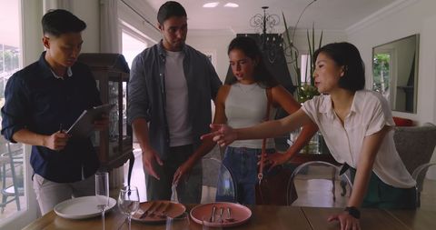 Friends Planning Wedding Together in Welcoming Home Atmosphere