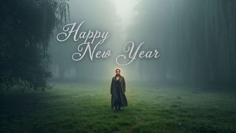 Lone Man Walking in Misty Forest Clearing with Happy New Year Script Overlay, Moody Scene
