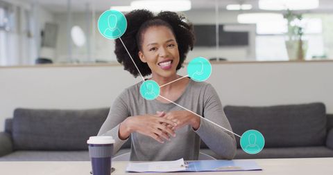 Businesswoman Engaging with Digital Network Data in Modern Office
