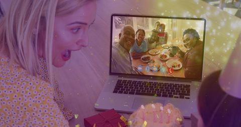 Joyful video call with family celebrating special occasion