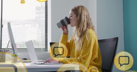 Businesswoman Engaging with Work on Laptop Surrounded by Social Media Alerts