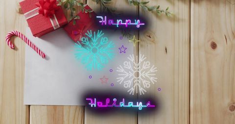 Festive christmas greeting with neon happy holidays text