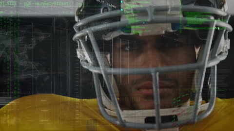 American Football Player Analyzing Digital Data Display