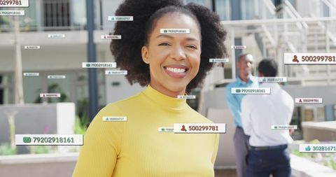 Data Processing Symbols Surrounding African American Businesswoman