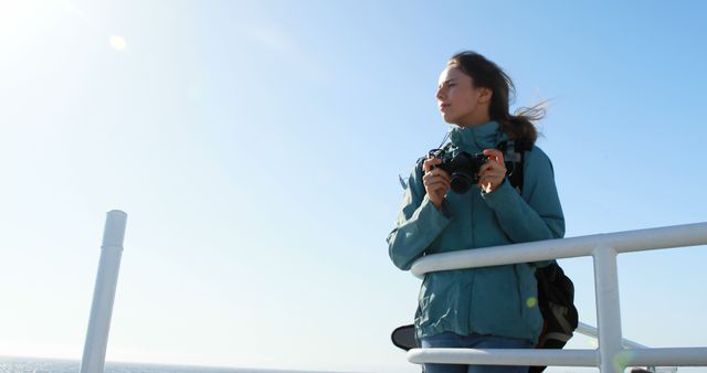 Woman Enjoying Photography on Outdoor Excursion in Bright Sun - Download Free Stock Images Pikwizard.com