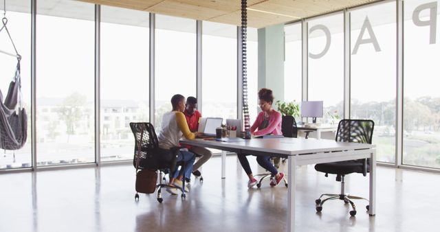 Young Professionals Collaborating in Modern Open-Plan Office - Download Free Stock Images Pikwizard.com