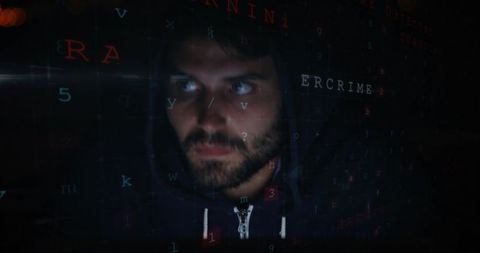 focused man in hoodie engaged in cyberspace activity against digital code - Download Free Stock Images Pikwizard.com