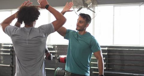 Men Enjoying Group Workout in Gym for Fitness Motivation
