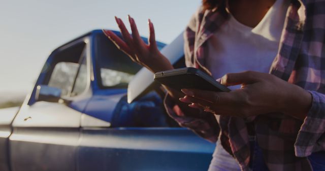 Woman with Broken Down Car Using Smartphone for Assistance - Download Free Stock Images Pikwizard.com