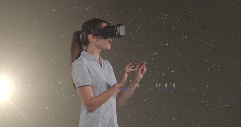 Businesswoman Experiencing Virtual Reality Amidst Glowing Stars