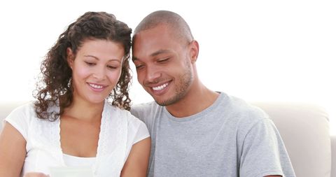 Happy Couple Sharing a Joyful Moment at Home - Download Free Stock Images Pikwizard.com