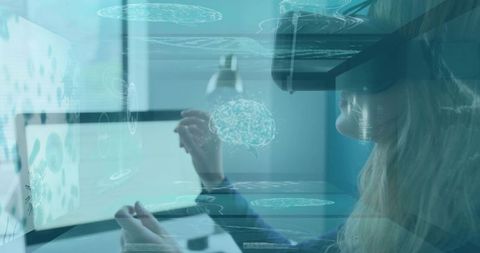 Female engineer wearing vr headset interacting with holographic brain interface in teal lab