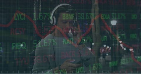 Young man smartphone headphones overlaid with stock market trends