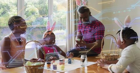 Black family decorating Easter eggs while wearing bunny ears with AR overlay