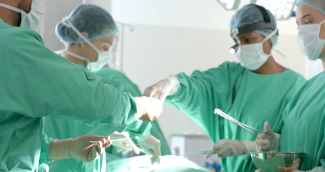 Surgical Team Collaborating in Operating Room - Download Free Stock Images Pikwizard.com