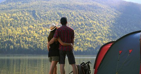 Couple Embracing by Lake on Scenic Camping Adventure in Autumn - Download Free Stock Images Pikwizard.com