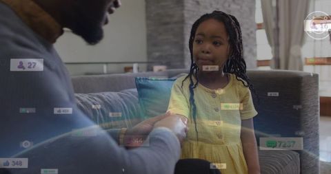 Father daughter sharing comforting handshake sunlit living room with social media overlays