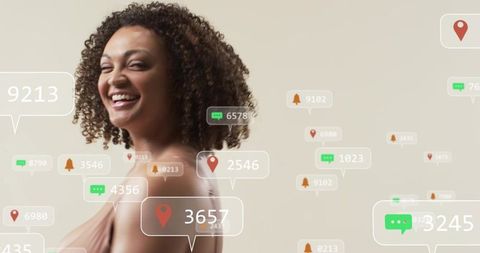 Smiling woman posing with floating social notifications, chat bubbles and location pins