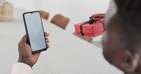 Man Video Calling for Surprise Gift Reveal at Home