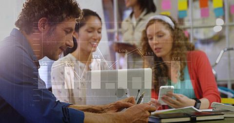 Diverse Team Analyzing Financial Reports with Digital Interface Overlay - Download Free Stock Images Pikwizard.com