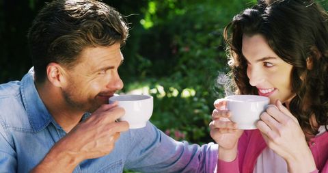 Couple Enjoying Coffee Together in Outdoor Setting - Download Free Stock Images Pikwizard.com
