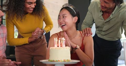 Colleagues Celebrating Birthday with Cake in Office Setting