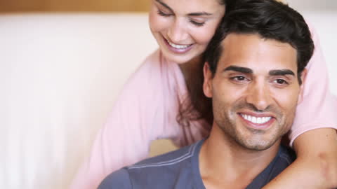 Happy Couple Relaxing Together at Home