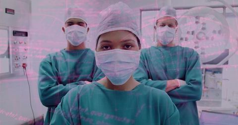 Surgical team standing in operating room wearing masks and teal scrubs with data overlay